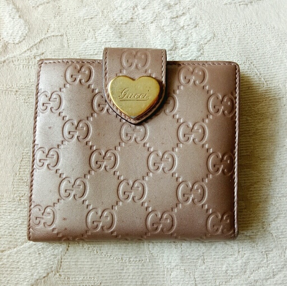 Gucci Handbags - Auth Gucci guccissima heart snap wallet nude color